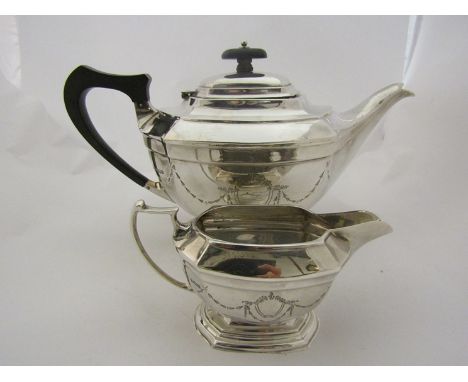 A four piece silver tea set with ribbon and garland decoration, Sheffield 1932 by A.Marks &amp; Sons Limited (1580 grams) ori