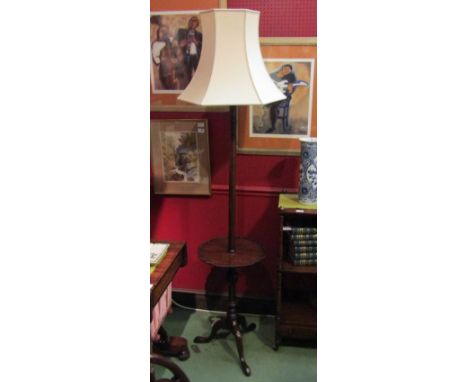 A Georgian style mahogany wine table/lamp standard (with shade) on turned column and tripod base,  184cm tall