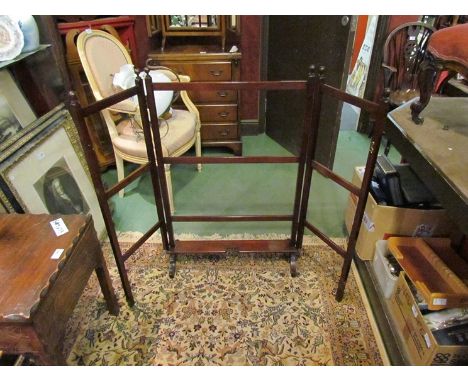 An Edwardian mahogany double gate action nine bar towel rail, the turned finials over sledge feet joined by a flat stretcher