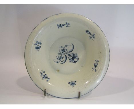 An 18th Century Worcester blue and white bowl, chipped and hair-lined, 18cm diameter