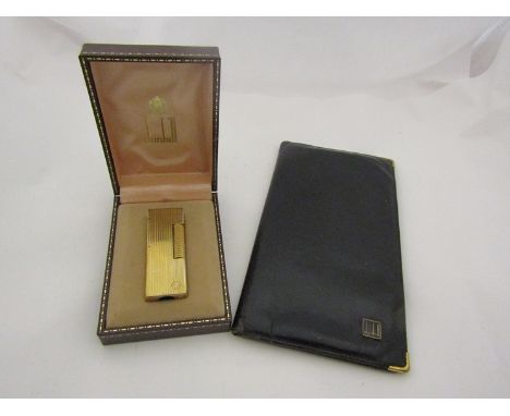 A Dunhill lighter and leather wallet