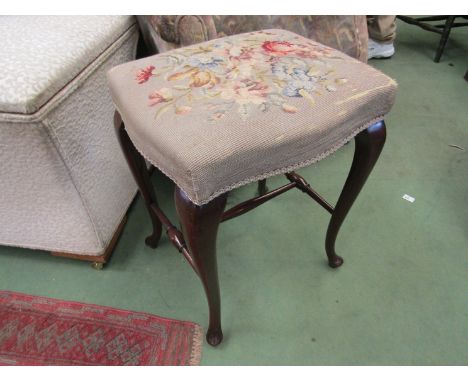 A 19th Century serpentine stool with tapestry upholstery, 55cm x 43cm