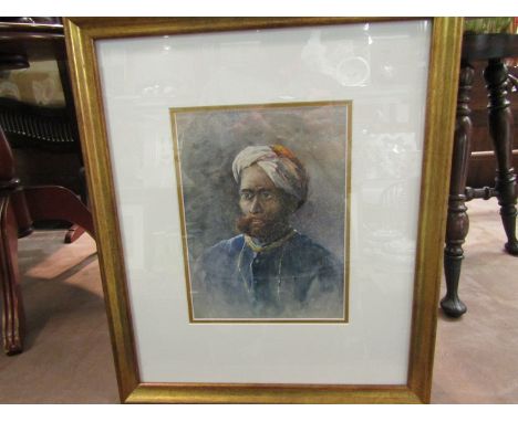 A framed and glazed watercolour portrait of Indian gentleman, in blue dress, 23cm x 17cm