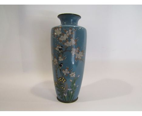 A light blue cloisonné vase depicting birds in foliage, 22cm tall