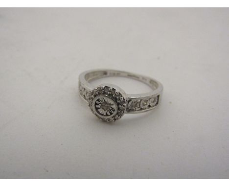 A 9ct white gold diamond ring. Size O, 2.3g