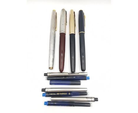 Four vintage four fountain pens, including a black Parker Sonnet with 18k gold nib, a vintage Parker with engraved sterling s