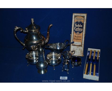 A plated condiment set, sauce boat, cream jug, teapot, etc; together with a set of Frank Mills Sheffield steel knives.