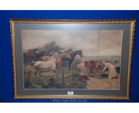 A framed and mounted print of horses in a field with a broken down motorcar which a gentleman is trying to fix with two ladie