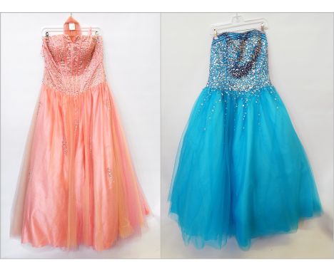 Prom dresses, one turquoise, full net and satin skirt with stiff petticoats, strapless bodice embroidered heavily with star s