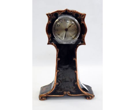 Art Nouveau mantel clock in the style of a miniature longcase with floral copper edging and eight-day movement  Live Bidding: