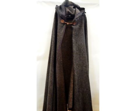 Saint Laurent Rive Gauche heavy woollen cloak, eastern style with hood having tassel and trimmed with brown braid, fastened w