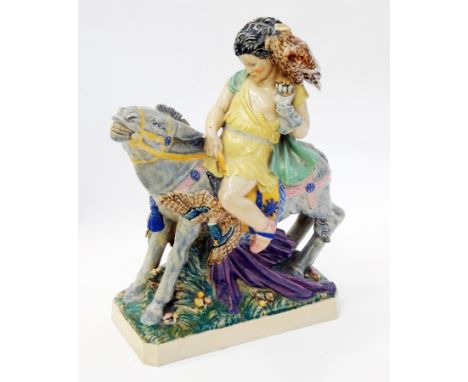 Charles Vyse glazed earthenware group, "The Falconer", boy seated on donkey carrying eagle and dead duck, incised "C Vyse, Ch