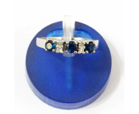 14K white gold, sapphire and diamond ring set three sapphires alternating with two diamonds  Live Bidding: If you would like 