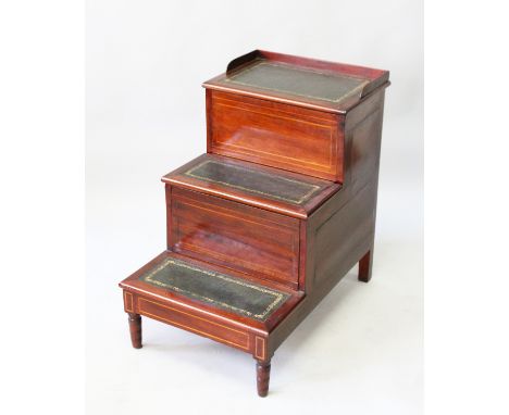 A REGENCY MAHOGANY STEP COMMODE with lift up flap, sliding pot drawer on short turned legs. 2ft 7ins high.