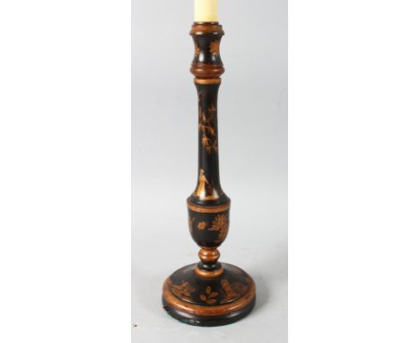 A BLACK LACQUER CANDLESTICK with Chinese decoration.