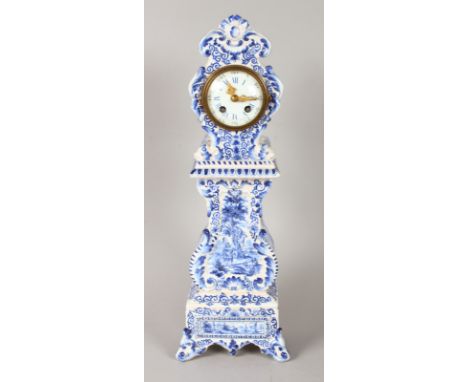 A GOOD 19TH CENTURY DUTCH BLUE AND WHITE POTTERY LONGCASE CLOCK, 18ins high, with eight-day movement with blue and white Roma