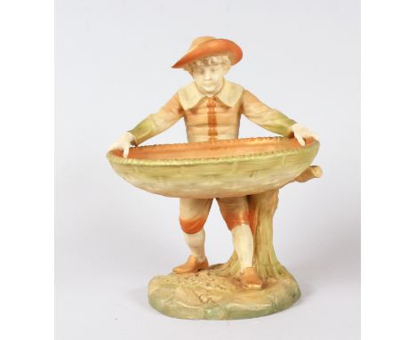 A ROYAL WORCESTER HADLEY FIGURE HOLDING A LARGE BOWL, Pattern No. 960.  9ins high.