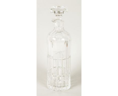 AN UNUSUAL CUT DECANTER AND STOPPER with pouring spout. 12ins high.