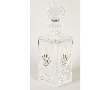 A SQUARE CUT WHISKY DECANTER AND STOPPER.