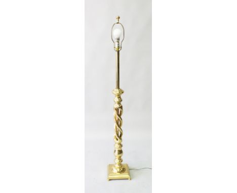 A GOOD BRASS NELL GWYNN STANDARD LAMP on a square base. 4ft 11ins high.
