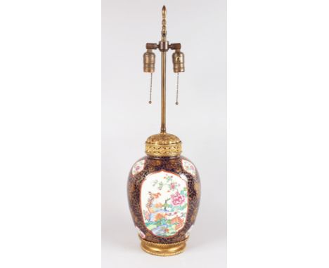 A VERY GOOD SAMSON CHIEN-LUNG GINGER JAR with rich blue ground edged in gilt and painted with panels of flowers, 10ins high, 