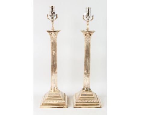 A LARGE PAIR OF CORINTHIAN COLUMN CANDLESTICKS converted to electric lamps. Stick 18.5ins high.