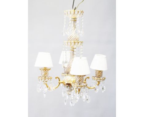 AN ORMOLU AND GILDED CRYSTAL FOUR BRANCH CHANDELIER with prism drops. 2ft 4ins high.