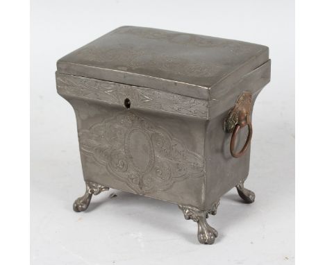 AN 18th CENTURY ENGRAVED PEWTER TEA CADDY AND COVER on four claw feet. 5ins high.