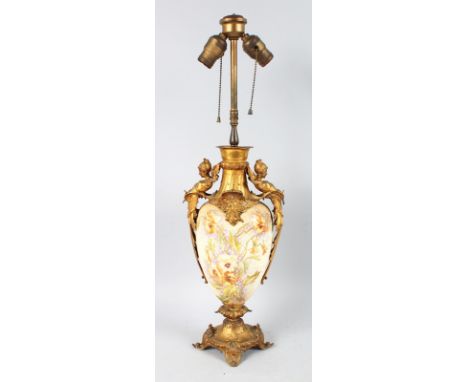 A 19th CENTURY FRENCH PORCELAIN AND ORMOLU LAMP with winged female supports on an ormolu base. 2ft 7ins high.