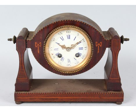 A 19TH CENTURY ROSEWOOD MANTLE CLOCK with blue and white Roman numerals and eight-day movement. 9.5ins (24cms) wide.