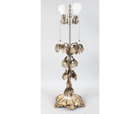 A LARGE VICTORIAN PLATED LAMP decorated with fruiting vines. Maker: H. W. & Co. 28ins high.