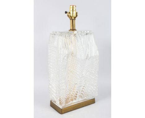 A GOOD 1970's SHAPED GLASS LAMP on a metal base. 16ins high.