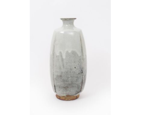 Jim Malone (born 1946) an Ainstable Pottery stoneware vase, shouldered slab form, covered to the foot with an ash glaze impre