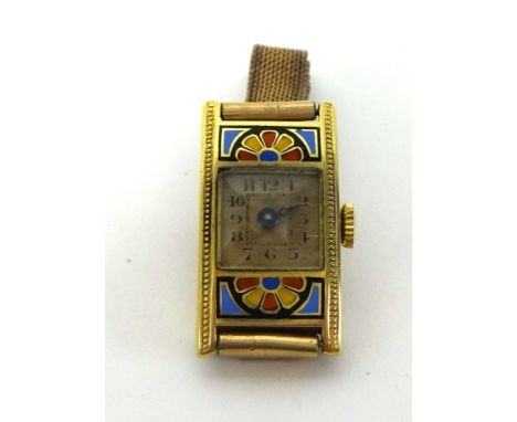 An 18k gold and enamel wrist watch of Art Deco design, stamped 18k with a 9ct gold metal core bracelet.