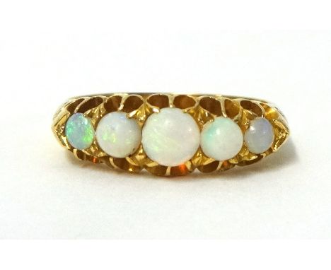 An 18ct gold five stone opal ring.