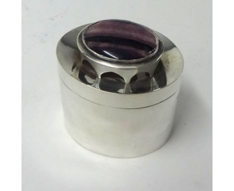 A modern silver box of arts and crafts design by Roberta Ayles, set with large stone, possibly Blue John, height 7cm.