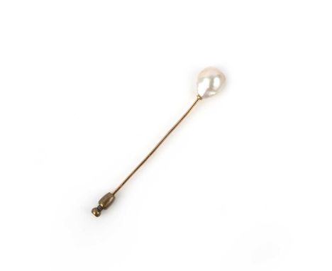 A pearl stickpin, set with a baroque pearl measuring approximately 12.8 x 10.4 x 6.4mm, to a gold stick pin, length 7.3cmAcco