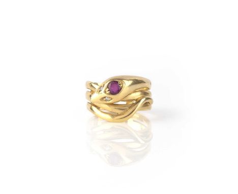 A ruby and diamond ring, designed as a coiled snake, its head set with a circular-cut ruby, its eyes set with single-cut diam