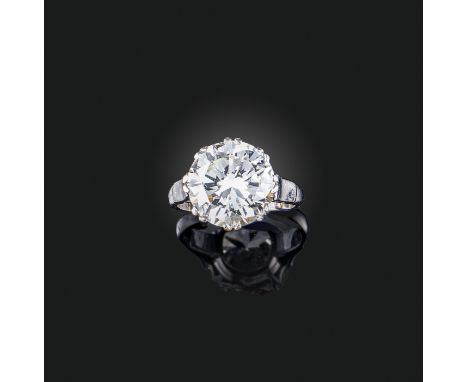 A diamond solitaire ring, claw-set with a brilliant-cut diamond weighing 6.10 carats, mounted in platinum, size H (sizing bea