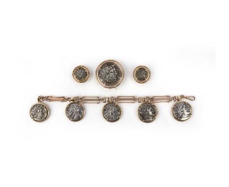 A gold and silver parure, comprising: a bracelet, ear clips and brooch, each set with silver medallions modelled from Ancient