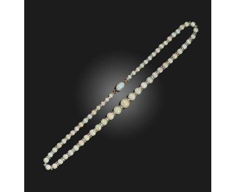 An opal bead necklace, early 20th century, composed of graduated opal beads measuring 3.8-8.6mm diameter, spaced by faceted r