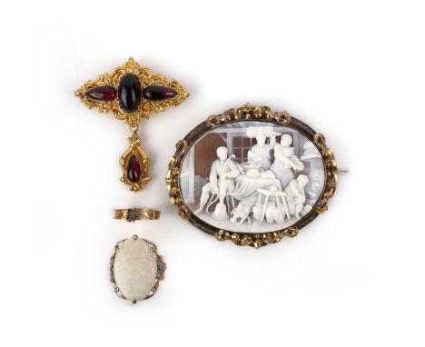 A collection of jewels, comprising: a large conch shell cameo brooch depicting a domestic scene, mounted in gold, measuring 6