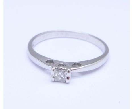 A 9ct white gold and square cut diamond solitaire ring, 2.1g, R