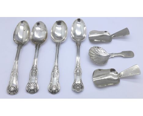 Four Kings pattern silver spoons, 129g, and three plated caddy spoons