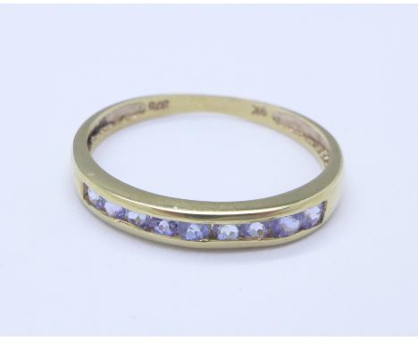 A 9ct gold and blue stone ring, 0.9g, O