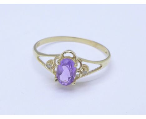 A 9ct gold, amethyst and small diamond ring, 0.9g, O