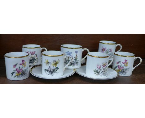 Eight Royal Worcester coffee cans and saucers