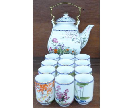 A Japanese tea service with teapot and twelve cups