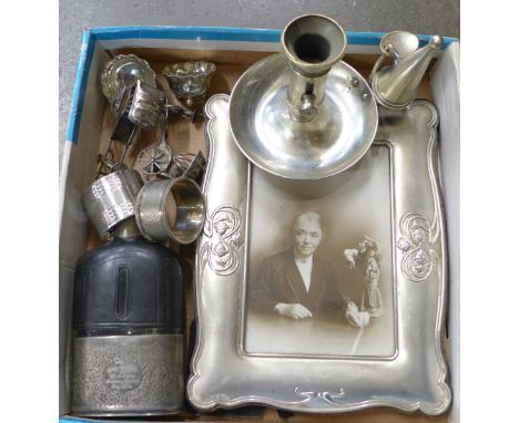 A hip flask, a reproduction photograph frame, chamber stick, etc.