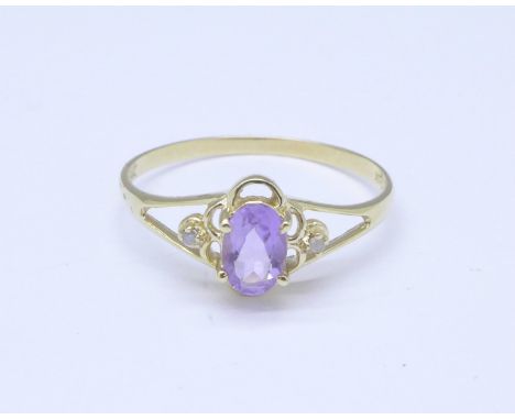 A 9ct gold, amethyst and small diamond ring, 0.9g, O